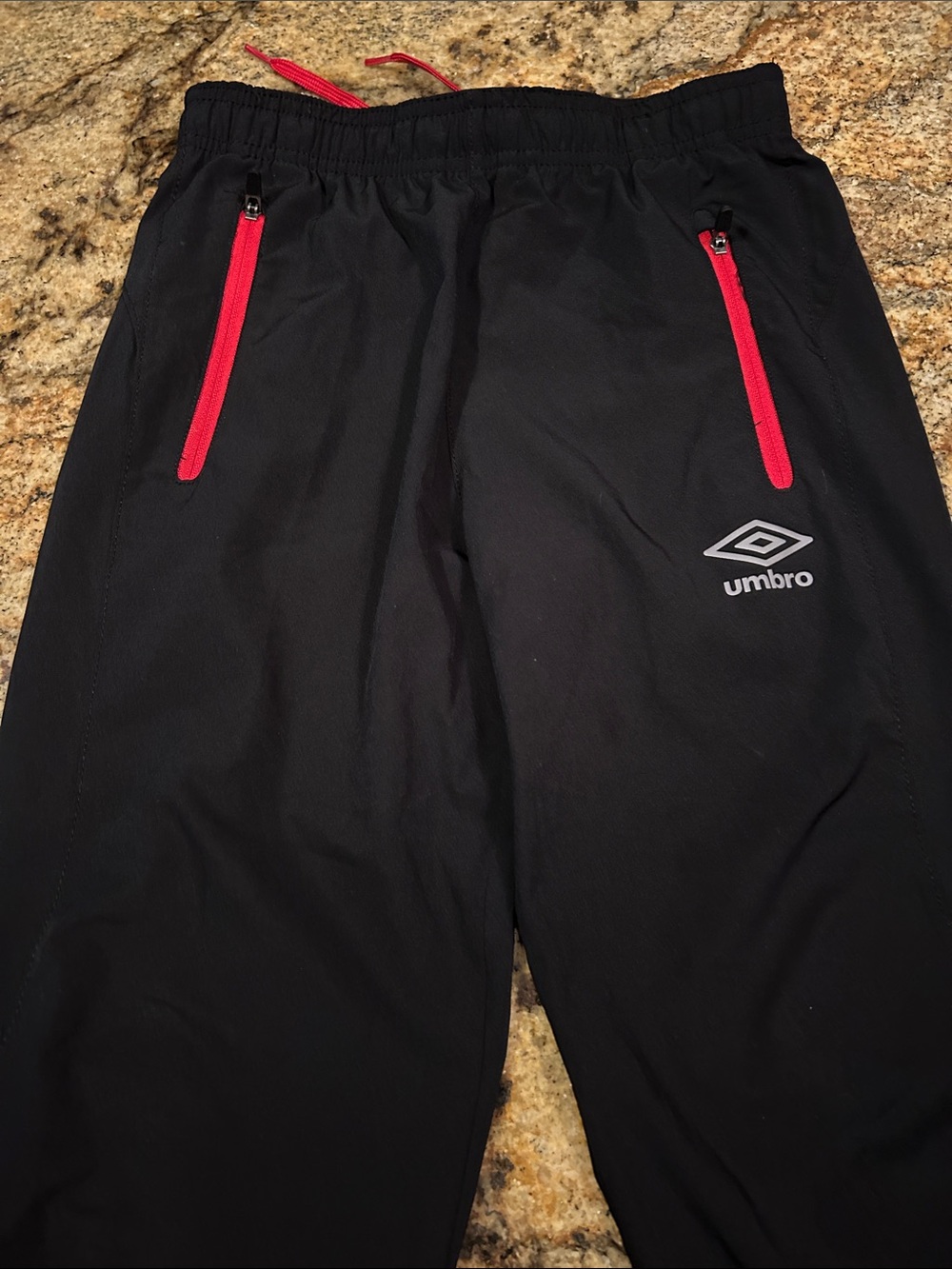 Umbro Black Joggers with Red Zip Details
